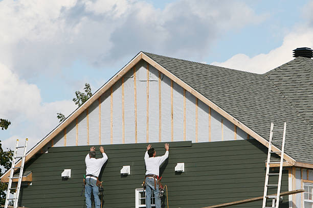 Professional Siding Installation technician working in Perry, GA